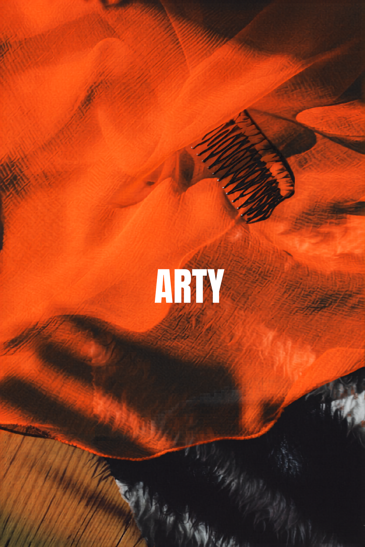 Voile de mariée orange sanguine CANEZAN et peigne, avec le mot « Arty »